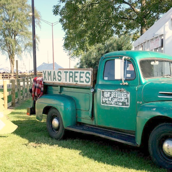 Vintage Chritmas Tree farm truck! Autumn inspiration, Fall farmhouse style decor, vintage wares, and handmade treasures mingle at Main Street Market (Urban Farmgirl) in Belvidere, Illinois - Hello Lovely Studio. #fleamarket #farmhousestyle #vintage #junkin