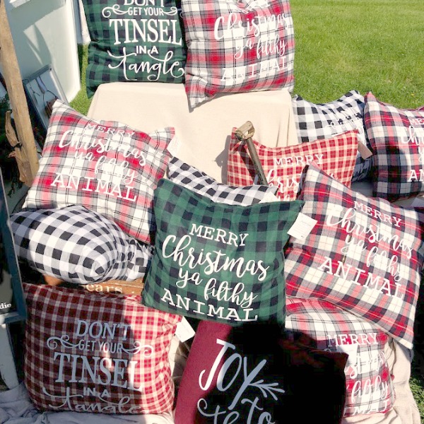Pillows! Come discover rustic fall decorating ideas in this photo gallery with ideas and resources! Vintage style, farmhouse decor, and junkin paradise in the fall - Main Street Market (Urban Farmgirl) in Belvidere, IL - Hello Lovely Studio. #fleamarket #vintage #farmhouse #countrydecor #midwest