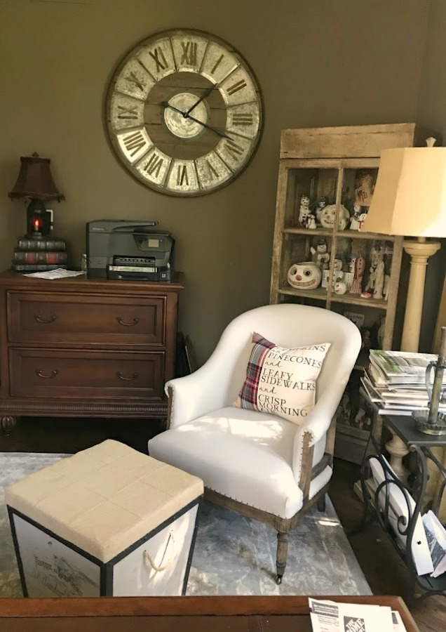 Fall pillow with plaid in a country house with moody green walls - Hello Lovely Studio.