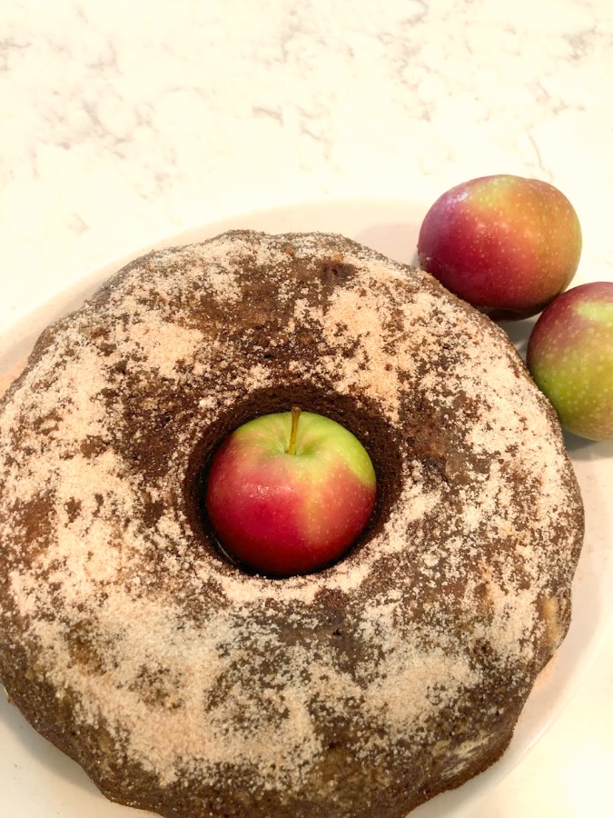 Recipe for easy homemade cinnamon cider donut cake from Hello Lovely Studio. #applecidercake #donutcake #applerecipe #applecake