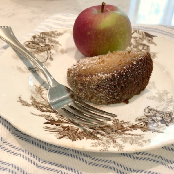 Recipe for easy homemade cinnamon cider donut cake from Hello Lovely Studio. #applecidercake #donutcake #applerecipe #applecake