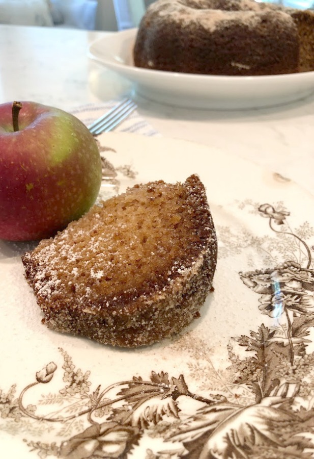 Recipe for easy homemade cinnamon cider donut cake from Hello Lovely Studio. #applecidercake #donutcake #applerecipe #applecake