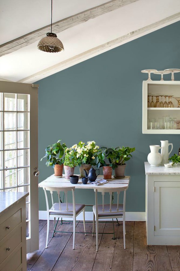 Blue Blood PPG paint color for walls of a white kitchen with farmhouse style.