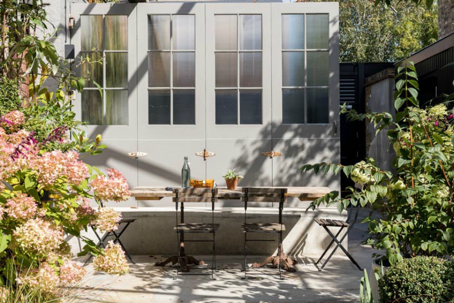 Charming outdoor dining. Stunning and soulful space designed by Imperfect Interiors in the UK - this East Dulwich Industrial Conversion sings!