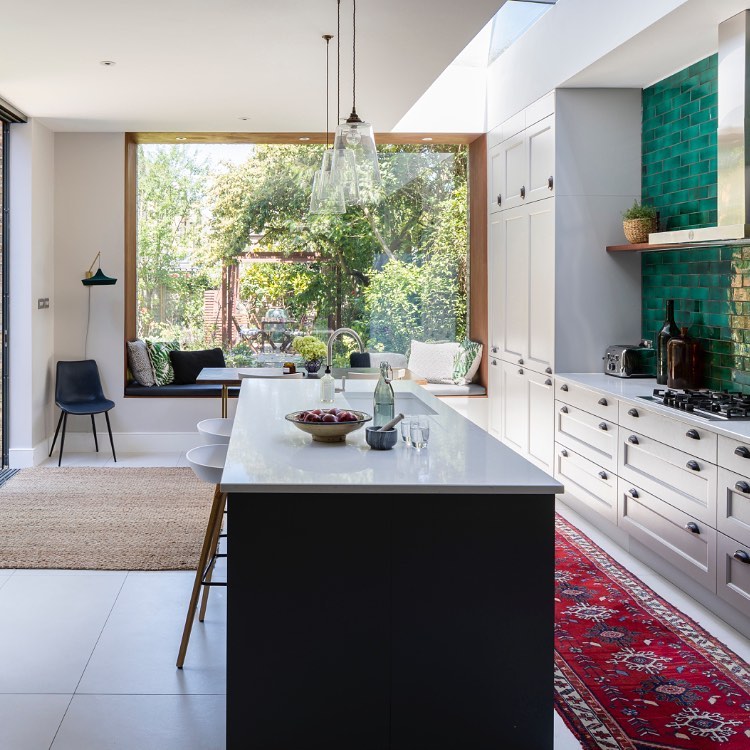 Beautiful bespoke English kitchen with grand picture window - Imperfect Interiors. #kitchendesign #bespokekitchen #picturewindow