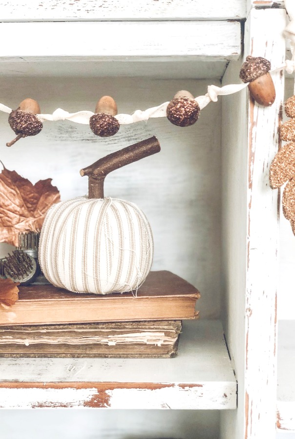 Autumn decor and Fall DIY craft ideas including wreaths with acorns and twigs are in the mix on Hello Lovely Studio! #falldecor #easydiy #fallgarland #fallmantel #tablescapeideas