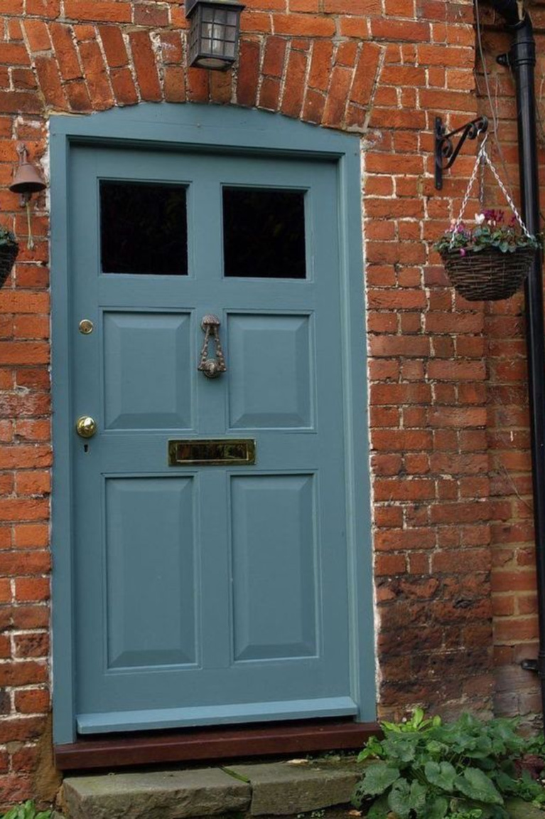 Beautiful Blue Gray (Farrow & Ball) paint color on front door of charming vintage European home with red brick - Verf Behang Marco van den Berg. #farrowandballbluegray #graypaintcolors #bluegray #paintcolors