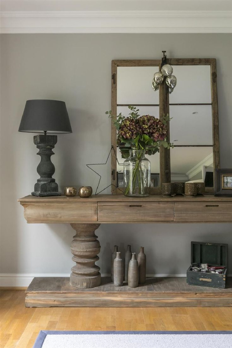 Farrow & Ball Pavilion Gray paint color on walls with beautiful rustic wood console and European country inspired decor - @Emilycoco. #paviliongray #farrowandball #paintcolors #graypaints