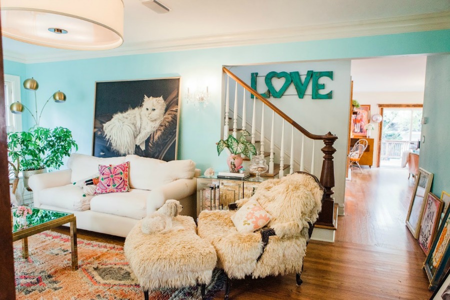 Living room. Be inspired by this photo gallery of vibrant colorful beachy boho interior design from artist Jenny Sweeney's Chicagoland home. Her art has been lifting spirits and opening hearts to wonder - see how it lives large in a charming suburban Tudor!