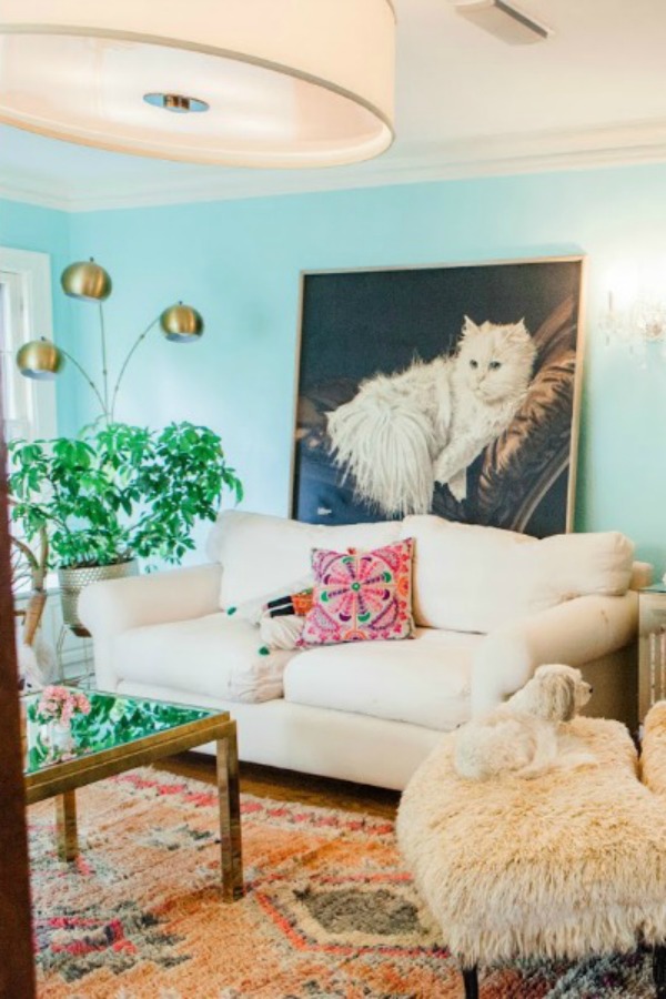 Be inspired by this photo gallery of vibrant colorful beachy boho interior design from artist Jenny Sweeney's Chicagoland home. Her art has been lifting spirits and opening hearts to wonder - see how it lives large in a charming suburban Tudor!