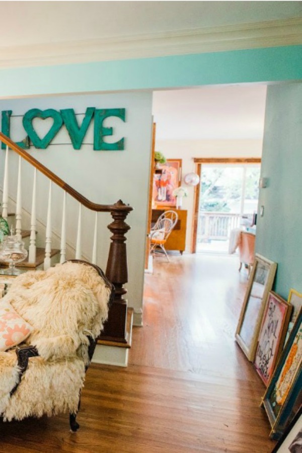 Be inspired by this photo gallery of vibrant colorful beachy boho interior design from artist Jenny Sweeney's Chicagoland home. Her art has been lifting spirits and opening hearts to wonder - see how it lives large in a charming suburban Tudor!