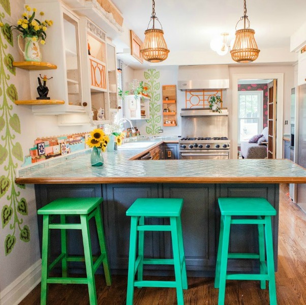 Be inspired by this photo gallery of vibrant colorful beachy boho interior design from artist Jenny Sweeney's Chicagoland home. Her art has been lifting spirits and opening hearts to wonder - see how it lives large in a charming suburban Tudor!