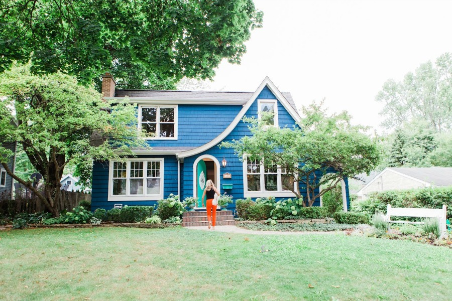 Tudor exterior - Be inspired by this photo gallery of vibrant colorful beachy boho interior design from artist Jenny Sweeney's Chicagoland home. Her art has been lifting spirits and opening hearts to wonder - see how it lives large in a charming suburban Tudor!