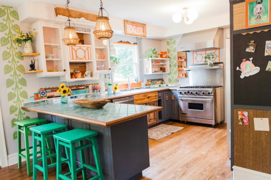 One of a kind kitchen! Be inspired by this photo gallery of vibrant colorful beachy boho interior design from artist Jenny Sweeney's Chicagoland home. Her art has been lifting spirits and opening hearts to wonder - see how it lives large in a charming suburban Tudor!