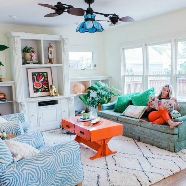 Be inspired by this photo gallery of vibrant colorful beachy boho interior design from artist Jenny Sweeney's Chicagoland home. Her art has been lifting spirits and opening hearts to wonder - see how it lives large in a charming suburban Tudor!