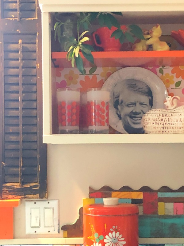 Shelf in kitchen. Be inspired by this photo gallery of vibrant colorful beachy boho interior design from artist Jenny Sweeney's Chicagoland home. Her art has been lifting spirits and opening hearts to wonder - see how it lives large in a charming suburban Tudor!