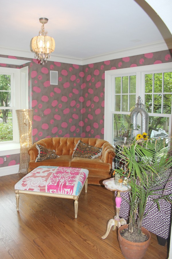 Boho style and vintage charm in a colorful, playful, laid back living room by Jenny Sweeney. #bohodecor #colorfuldecor #interiordesign #eclectic