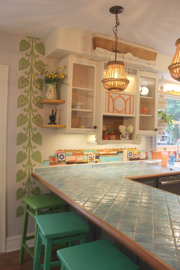 Boho style and quirky vintage charm in a colorful, playful, custom kitchen by Jenny Sweeney. #colorfulkitchen #kitchendesign #bohodecor #colorfuldecor #interiordesign #eclectic