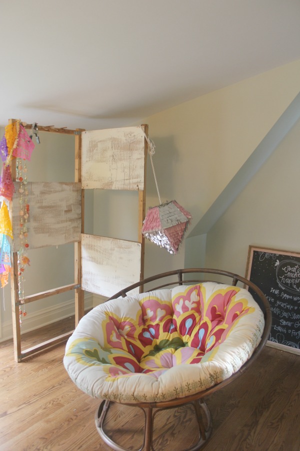 Floral printed apasan chair in a quirky beachy boho bedroom by Jenny Sweeney.