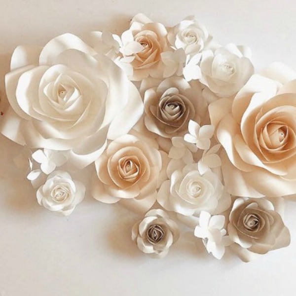 Handmade paper flowers for beautiful feminine wall decor for a bedroom or child's nursery. #handmade #paper #flowers