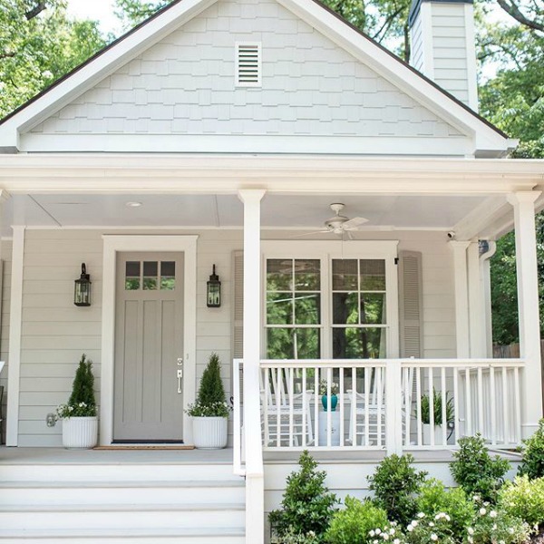 Repose Gray by Sherwin Williams paint color on the siding and Dorian Gray painted front door by Bell Sheep Studio. #paintcolors #bestgrey #doriangray #reposegray #interiordesign