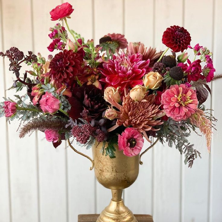 Gorgeous fall floral arrangement centerpiece in a trophy cup - The Flower Theory. #floralarrangements #fallflorals #centerpieces 