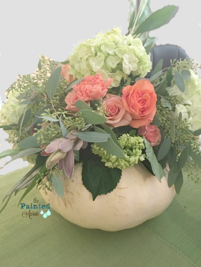 Fall tablescape centerpiece! A white pumpkin filled with fresh flowers - a creation by The Painted Apron.