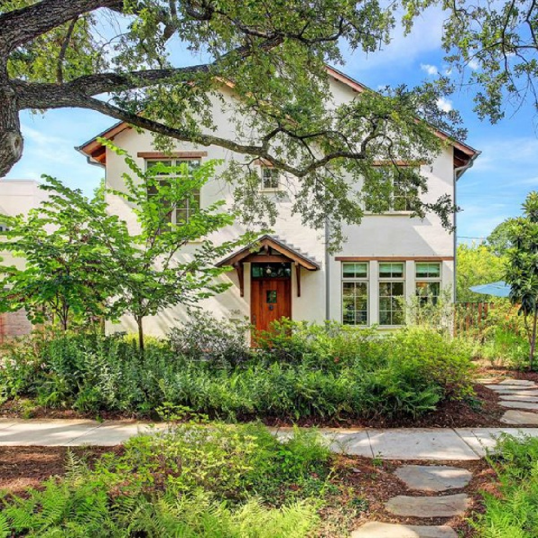 Front facade of a magnificent Modern Belgian Houston home by architect Kelly Cusimano and crafted by Marcellus Barone of Southampton Homes. #belgianartchitecture #houseexterior 