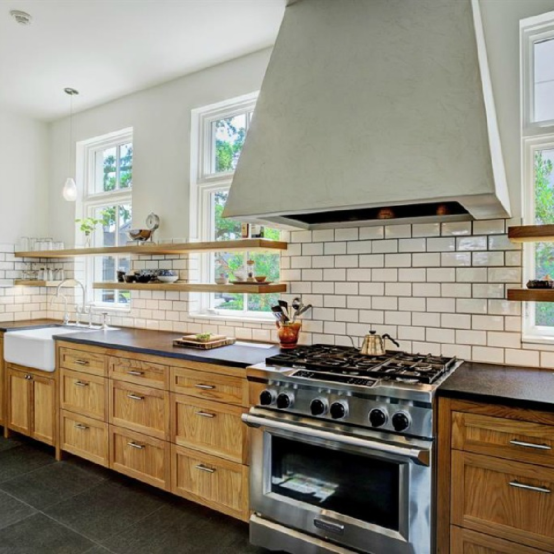 Belgian kitchen design with natural materials, plaster, and stone in a zen Houston home by architect Kelly Cusimano and crafted by Marcellus Barone of Southampton Homes. #belgianartchitecture #belgiankitchen