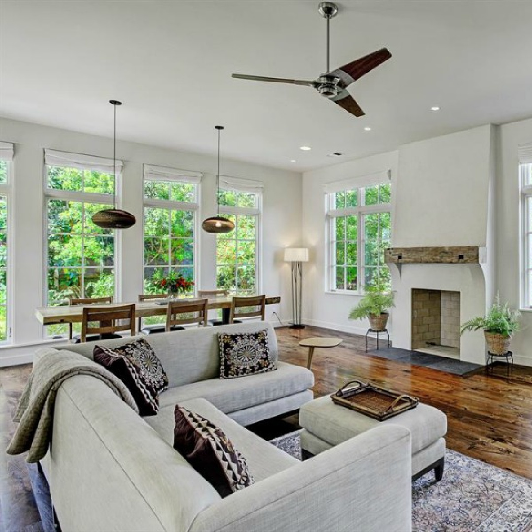 Belgian living room with minimal decor, plaster walls, and simplicity in a modern zen Houston home by architect Kelly Cusimano and crafted by Marcellus Barone of Southampton Homes. #belgianstyle #livingroom #modernbelgian #Europeancountry #minimaldesign