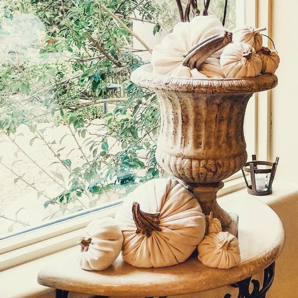 Tone on tone ethereal magic in this fall vignette by After Orange County. #fallvignette #whitepumpkins #frenchcountry #autumndecor