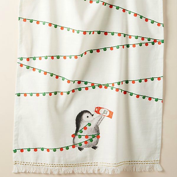 Whimsical penguin dishtowel for your holiday kitchen is a smile for you or the perfect gift. #holidaydecorating #penguin #dishtowel