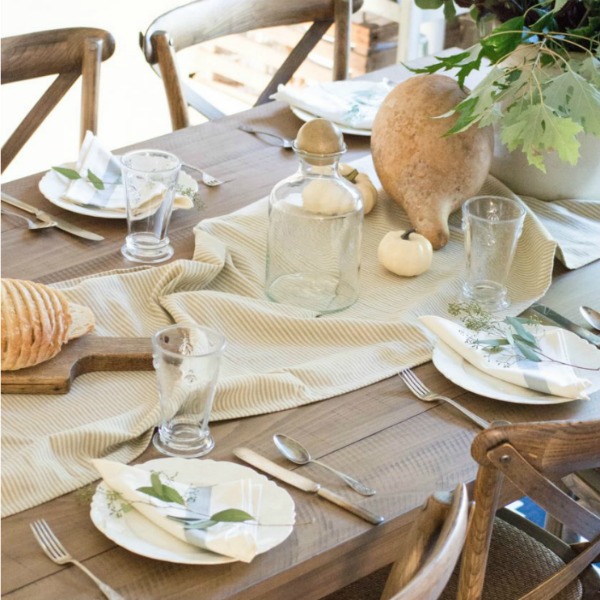 Soft autumn tablescape for fall with stripe runner, pale colors, and country simplicity - Unexpected Elegance. #falltable #tablescape #farmtable #neutrals