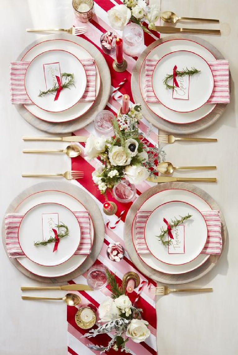 Cheerful and cozy red peppermint pinstripe theme tablescape for Christmas and holidays.