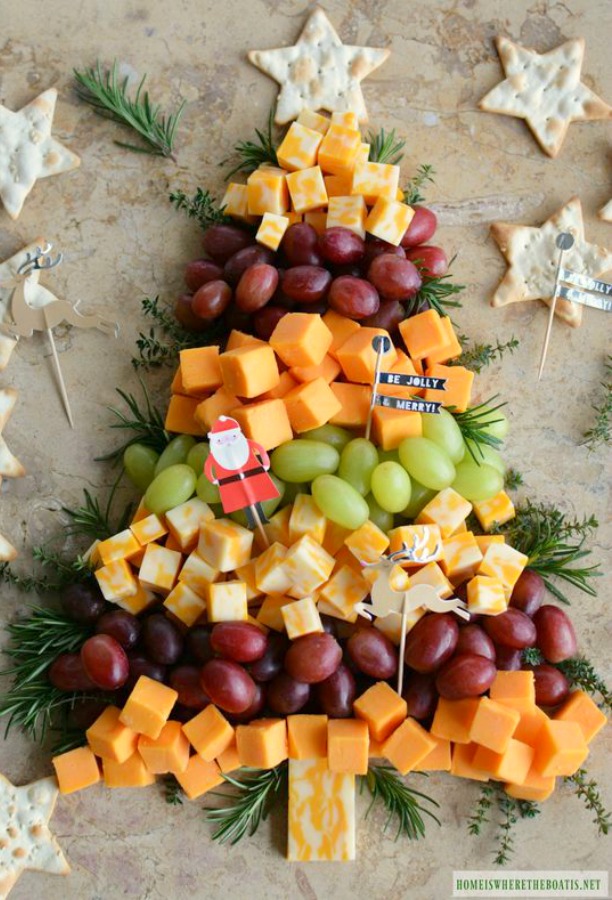 Creative and whimsical Christmas tree cheese board for a holiday party and easy entertaining. Home is Where the Boat Is. #cheeseboard #christmastree #holidayparty #appetizers