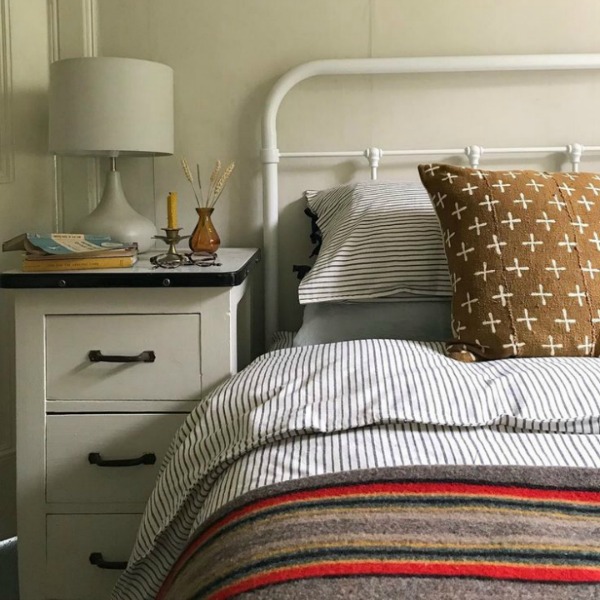 Beautiful white English cottage bedroom painted Farrow & Ball Shaded White - Design by Homestead. #farrowandball #shadedwhite #bedroom #cottagestyle #englishcountry