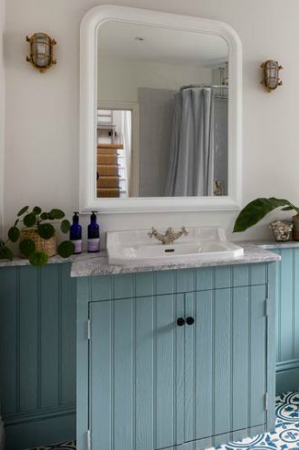 Teal blue painted bathroom vanity in a lovely design by Imperfect Interiors in the UK.PLEASE COME SEE Traditional Style Bathroom Vanity Design Inspiration as well as Vintage Bath Ideas. #bathroomdesign #bathroomvanities #interiordesign