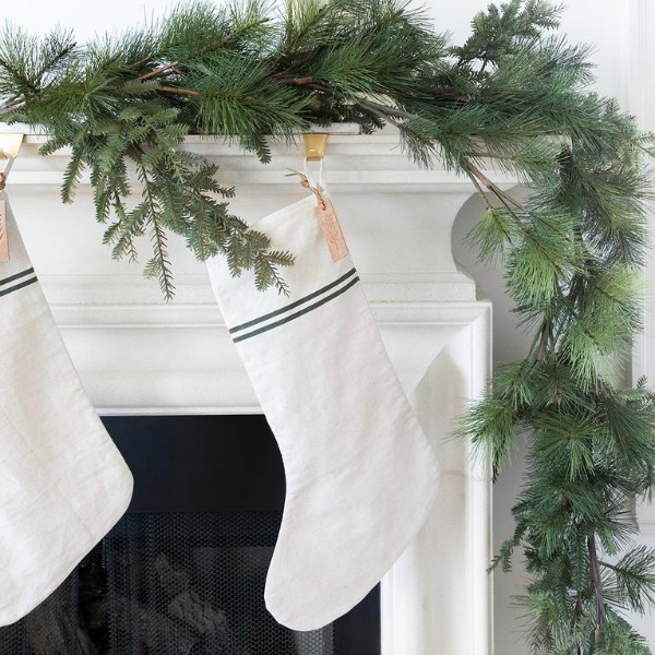 Stripe stocking is a classic addition to your holiday fireplace mantel! #stockings #holidaydecor #stripes