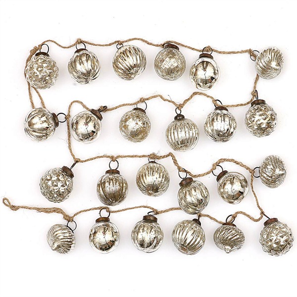 Mercury Glass bulbs garland adds whimsy and vintage style to any holiday home. #christmasdecor #mercuryglass #christmastree #glassbulbs