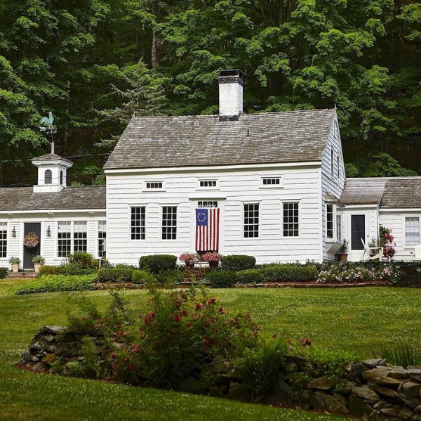 Beautiful exterior of a white cottage in Connecticut with interior design by Nora Murphy. Come get Inspiring Autumn Feels From Instagrammers to Follow + Encouragement Quotes! #whitecottage #houseexterior #newengland #Connecticuthouse #beautifulhouse #architecture #historiccottage #noramurphy