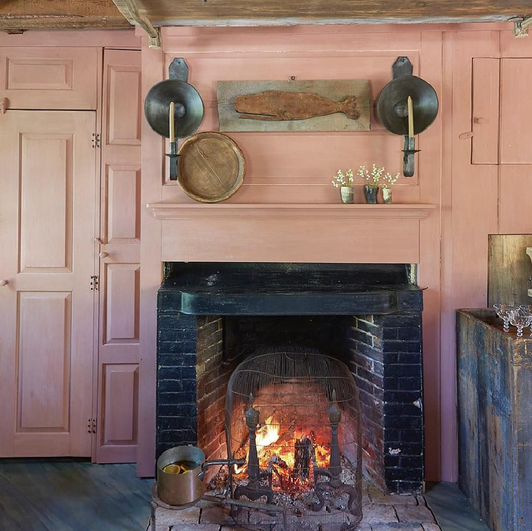 Salmon pink panels and rustic fireplace in Dudley Pike Tavern - featured in Nora Murphy's Country House book.