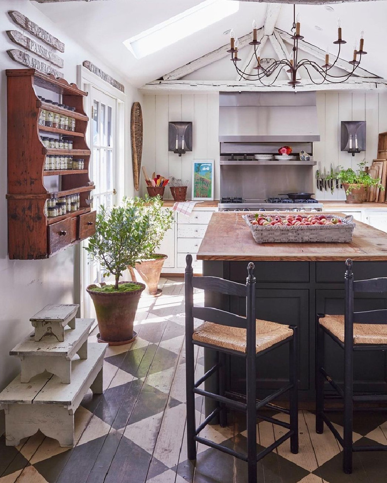 Nora Murphy's charming country kitchen in her Connecticut farmhouse with checkered floors and primitives. #noramurphy #countrykitchen #checkeredfloor