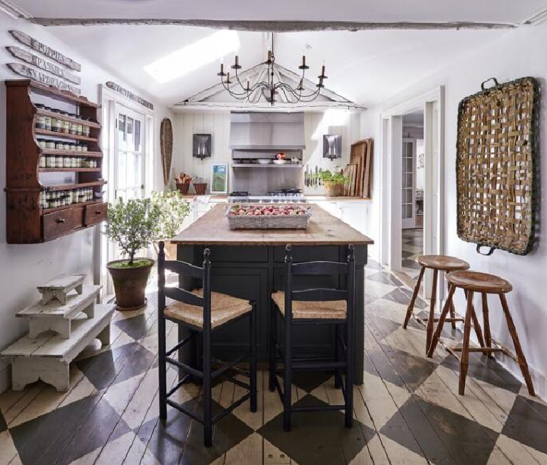 Nora Murphy's charming country kitchen in her Connecticut farmhouse with checkered floors and primitives. #noramurphy #countrykitchen #checkeredfloor
