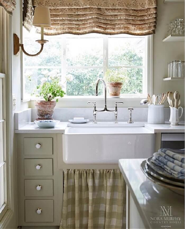 Beautiful country kitchen with farm sink in Nora Murphy's Country House book.