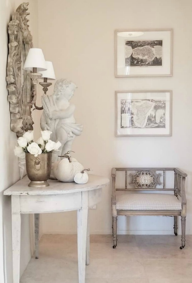 Elegant French country furnishings, white pumpkins, and white roses - interior design by The French Nest Co. #frenchcountry #interiordesign #toneontone #whitepumpkins