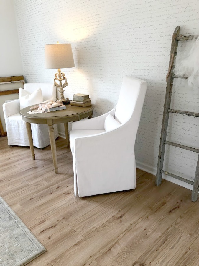 My white studio with Belgian style linen chairs and European country style - Hello Lovely Studio. #whitelinen #serenedecor