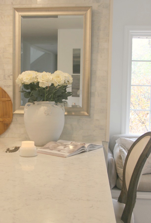 My white kitchen with Viatera Minuet quartz countertops and marble subway tile backsplash - Hello Lovely Studio. #minuet #viateraquartz