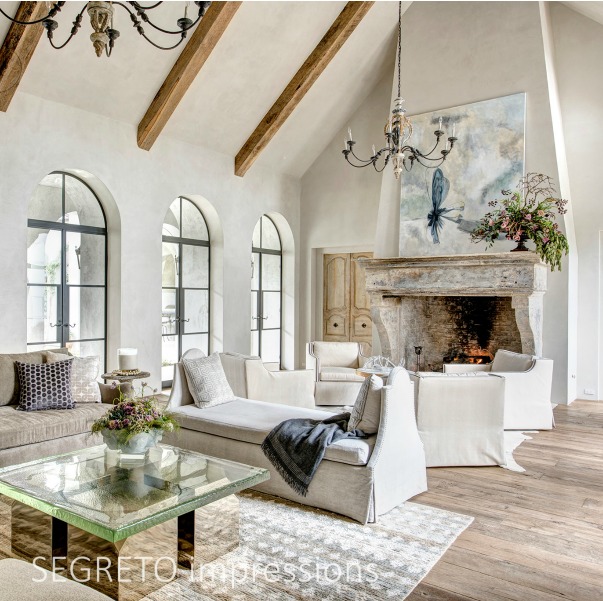 From SEGRETO impressions (2019) by Leslie Sinclair. This great room incorporates beams from the homeowner's South Texas ranch as well as 18th-century doors from Avignon. #interiordesign #frenchcountry #plasterwalls #greatroom