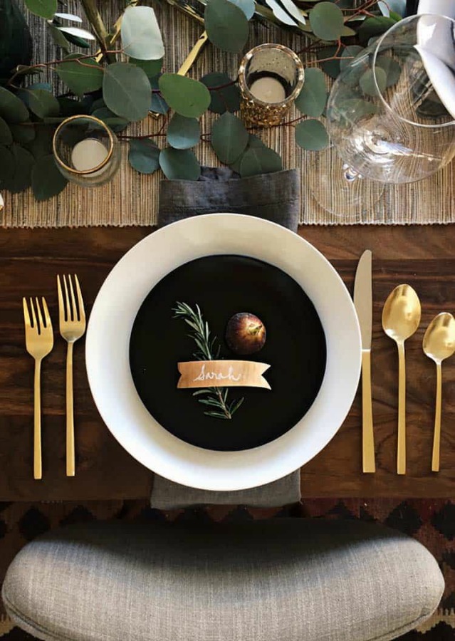 Classic table setting for Thanksgiving with gold flatware and black and white - Sarah Sherman Samuel. #thanksgiving #tablescape #falltable #tabledecor #minimal