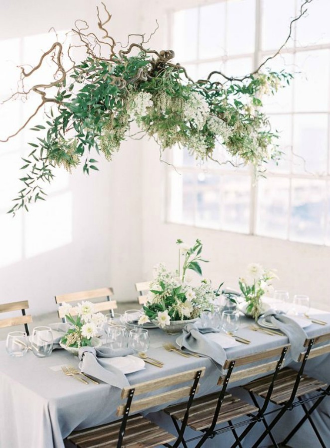 A beautiful and ethereal table setting idea for Thanksgiving or a romantic dinner with floral swag suspended from ceiling - Magnolia Rouge. #romantic #tablescape #tabledecor A#entertainingidea